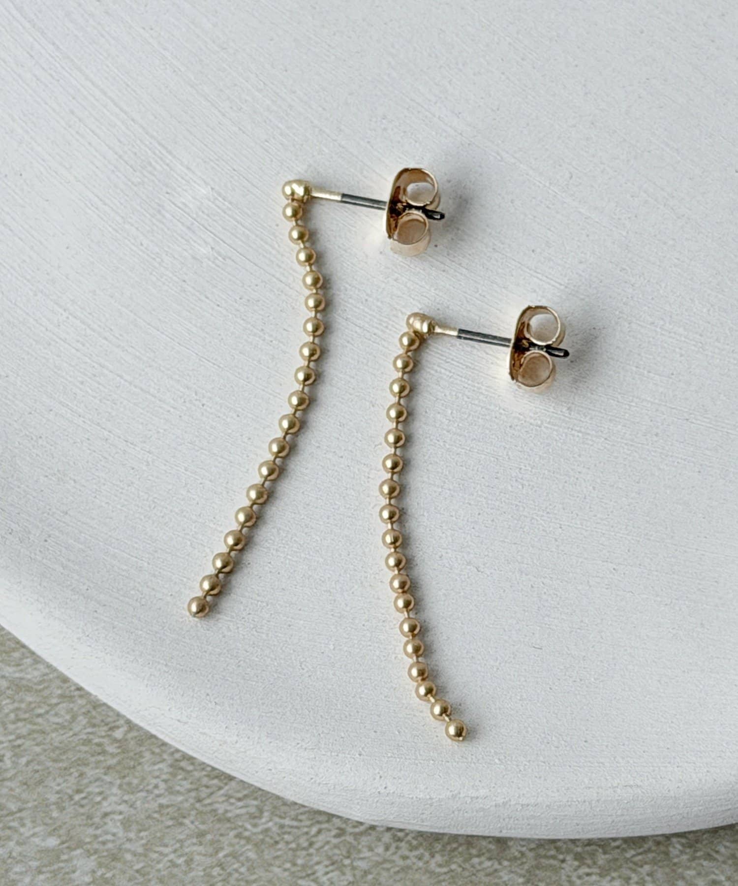 3COINS(スリーコインズ) 連ボールチェーンピアス