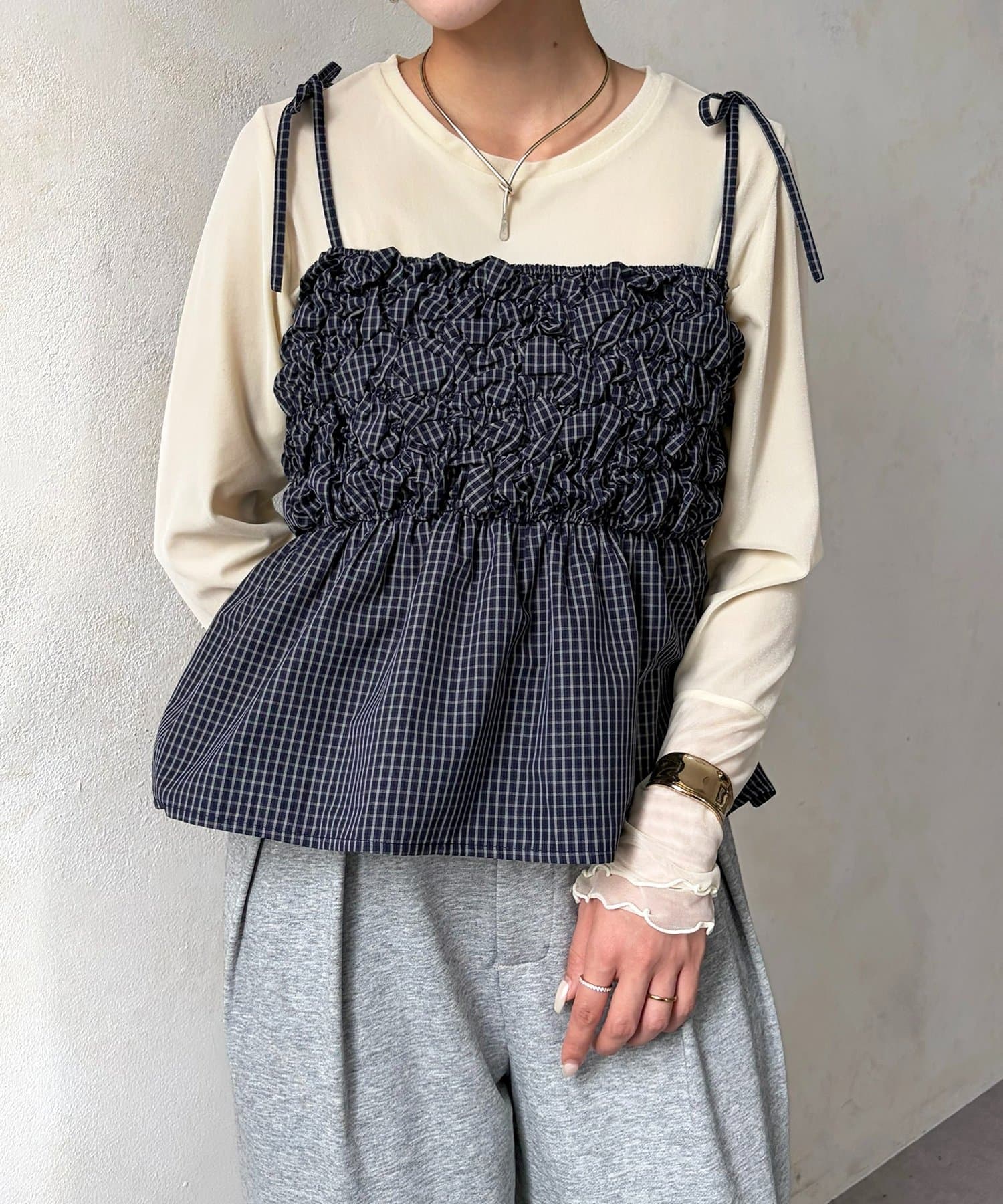 Thevon.(ゼヴォン) チェック柄シャーリングペプラムビスチェ