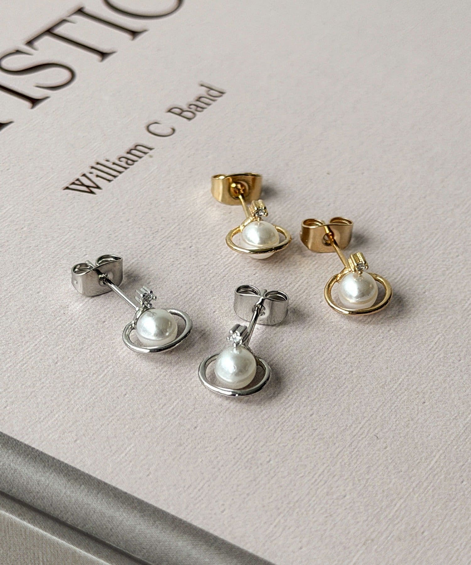 3COINS(スリーコインズ) 土星モチーフピアス