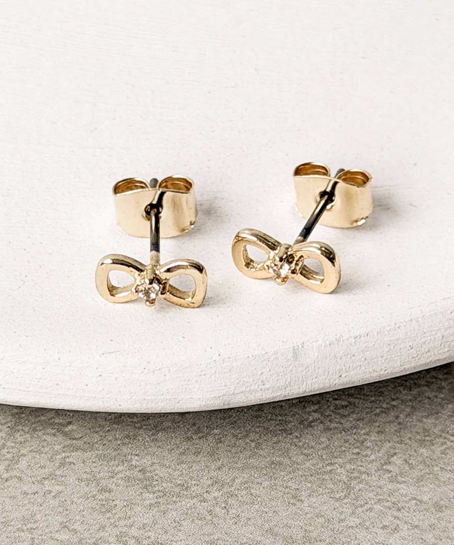 3COINS(スリーコインズ) オープンリボンピアス
