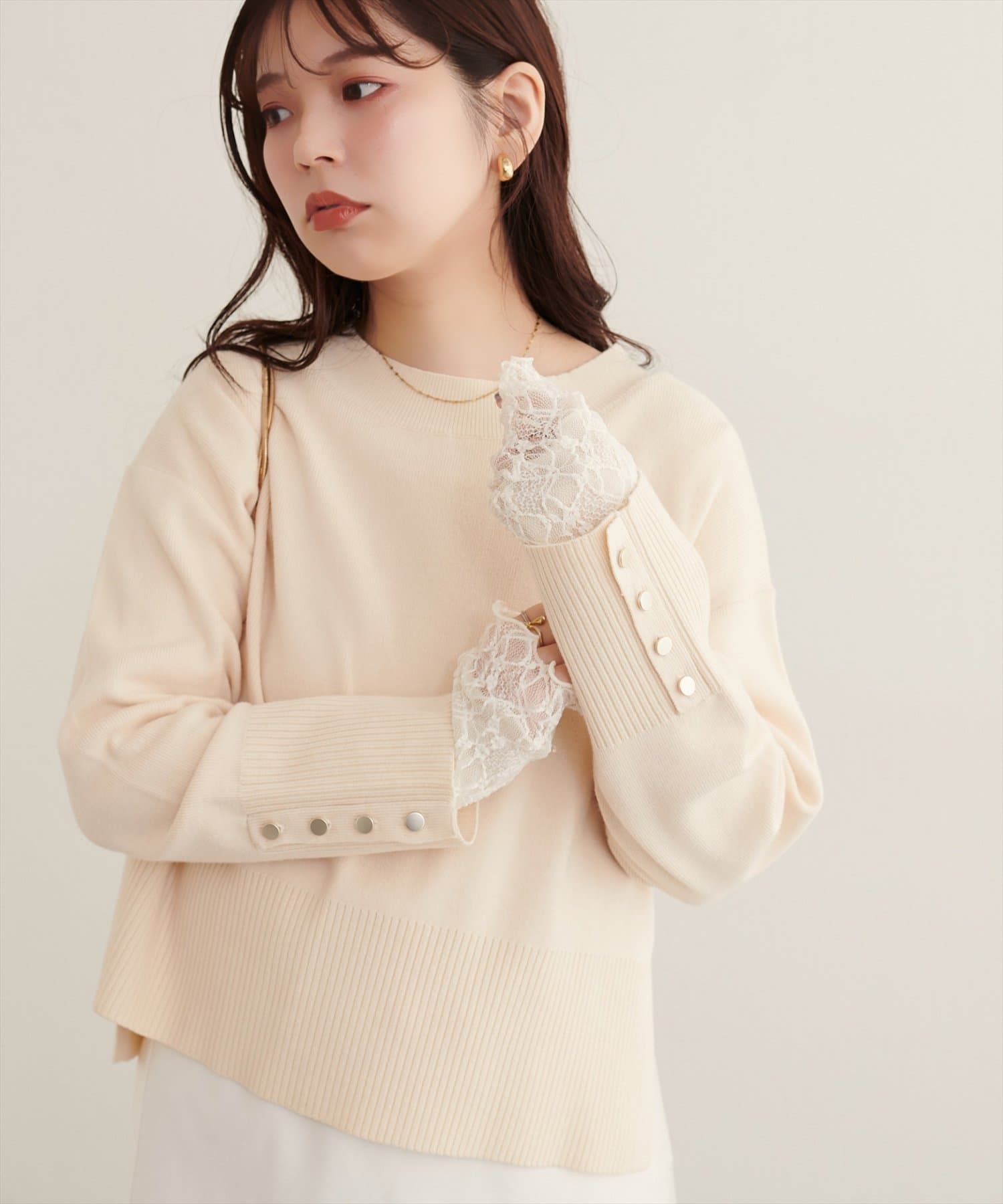 natural couture(ナチュラルクチュール) スタンドネック袖口釦ゆるニット