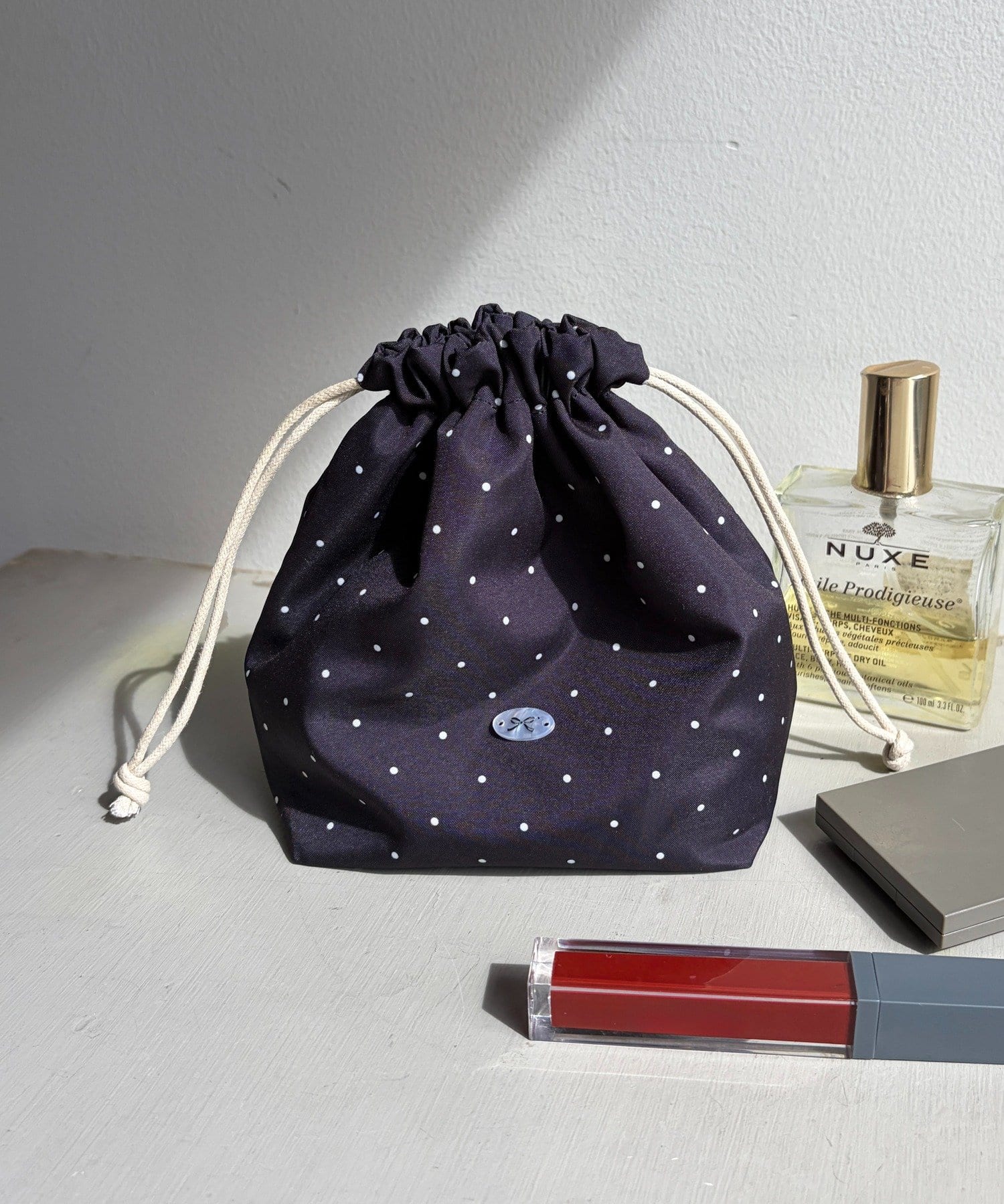 Lattice(ラティス) リボン巾着ポーチ